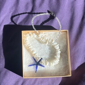 White Shell Necklace with Blue Starfish Pendant